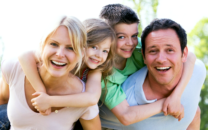 Young family with insurance provided by Enhanced Coverage Group